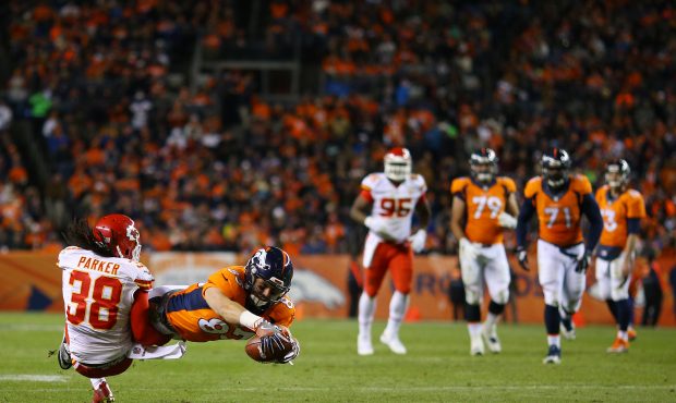 DENVER, CO - NOVEMBER 27:  Tight end A.J. Derby #83 of the Denver Broncos stretches for more yards ...