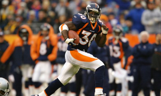 30 Dec 2001:  Running back Terrell Davis #30 of the Denver Broncos hits his stride with a 34 yard g...