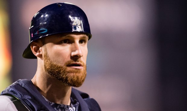 Jonathan Lucroy #20 of the Milwaukee Brewers walks back to the dugout in the eighth inning during t...