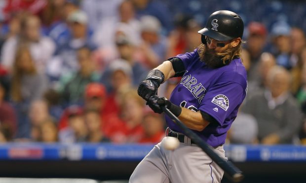 Charlie Blackmon #19 of the Colorado Rockies hits a two-run double against the Philadelphia Phillie...