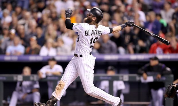 Charlie Blackmon #19 of the Colorado Rockies hits a home run in the eighth inning against St Louis ...
