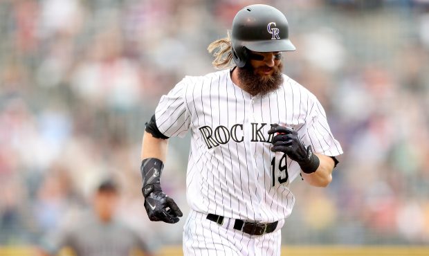 DENVER, CO - JUNE 22:  Charlie Blackmon #19 of the Colorado Rockies circles the bases after hitting...