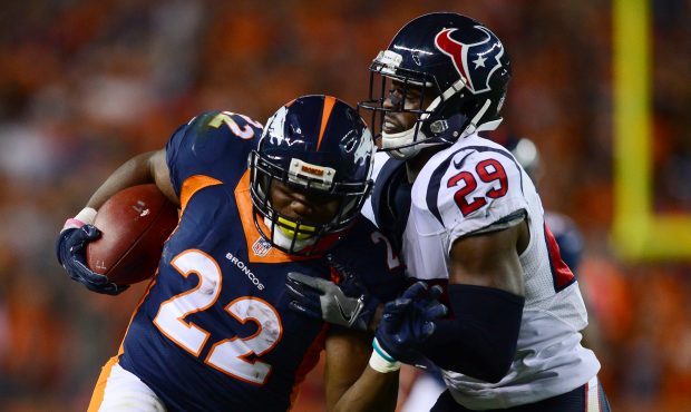DENVER, CO - OCTOBER 24:  Running back C.J. Anderson #22 of the Denver Broncos rushes for 19 yards ...