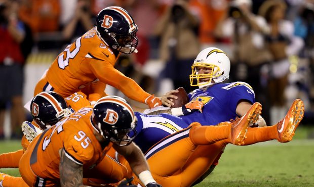SAN DIEGO, CA - OCTOBER 13:   Jared Crick #93,  Derek Wolfe #95, and  Von Miller #58 of the Denver ...