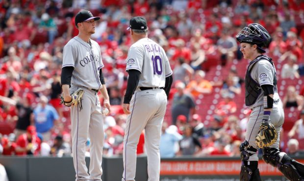CINCINNATI, OH - MAY 21: Kyle Freeland #31 of the Colorado Rockies talks to manager Bud Black and c...