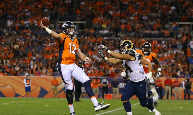 DENVER, CO - AUGUST 27: Quarterback Paxton Lynch #12 of the Denver Broncos throws a pass before get...