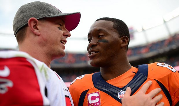 DENVER, CO - OCTOBER 9:  Quarterback Matt Ryan #2 of the Atlanta Falcons talks with wide receiver D...