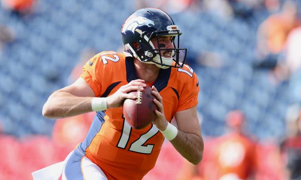 DENVER, CO - OCTOBER 30:  Quarterback Paxton Lynch #12 of the Denver Broncos warms up before the ga...
