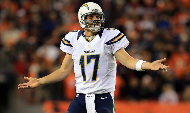 DENVER, CO - NOVEMBER 18:  Quarterback Philip Rivers #17 of the San Diego Chargers reacts after a p...