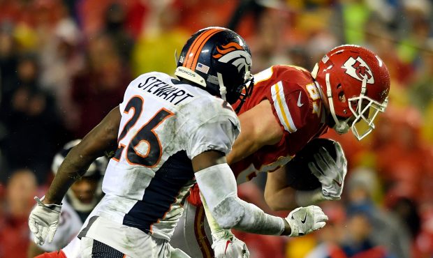 KANSAS CITY, MO - DECEMBER 25: Tight end Travis Kelce #87 of the Kansas City Chiefs carries the bal...