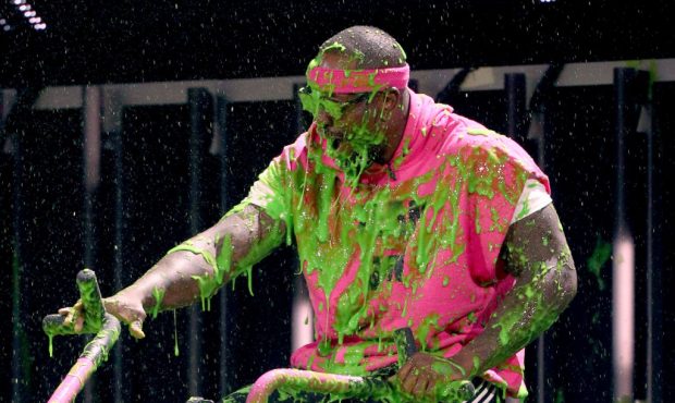 LOS ANGELES, CA - JULY 13:  NFL player Von Miller gets slimed onstage during Nickelodeon Kids' Choi...