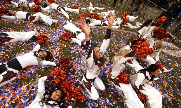 DENVER, CO - JANUARY 24: The Denver Broncos cheerleaders celebrate after defeating the New England ...