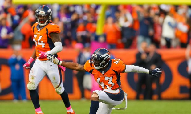 DENVER, CO - OCTOBER 4: Strong safety T.J. Ward #43 and Brandon Marshall #54 of the Denver Broncos ...