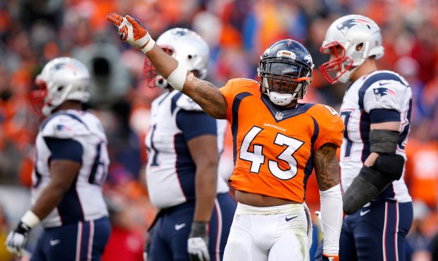 DENVER, CO - JANUARY 24:  T.J. Ward #43 of the Denver Broncos gestures after a play in the first ha...