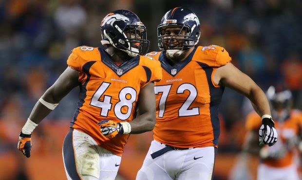 DENVER, CO - SEPTEMBER 03:  Shaquil Barrett #48 of the Denver Broncos celebrates a sack against the...