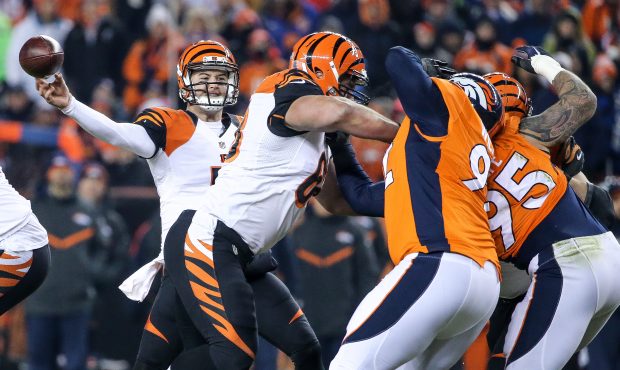 Quarterback AJ McCarron #5 of the Cincinnati Bengals passes against the Denver Broncos during a gam...