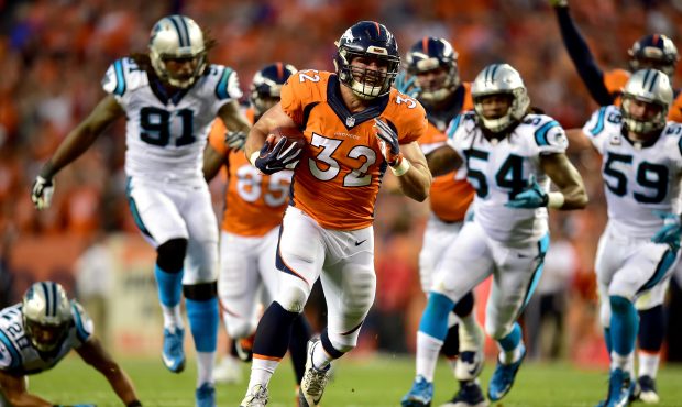DENVER, CO - SEPTEMBER 08:  Fullback Andy Janovich #32 of the Denver Broncos scores on a 28-yard to...
