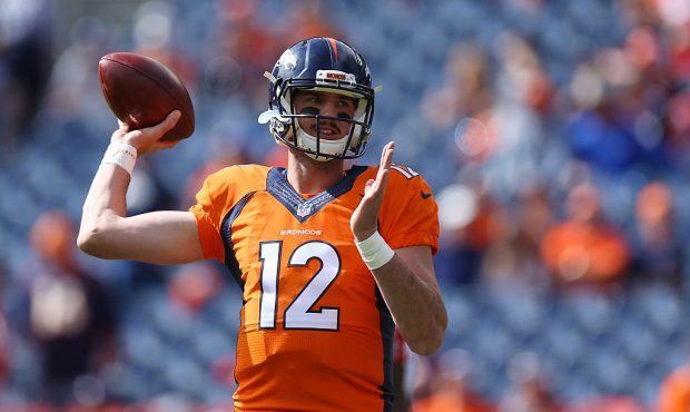 DENVER, CO - OCTOBER 9:  Denver Broncos quarterback Paxton Lynch #12 practices throwing before the ...