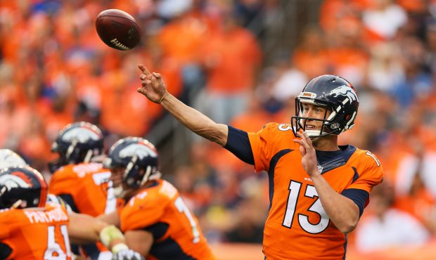 Quarterback Trevor Siemian #13 of the Denver Broncos throws in the fourth quarter of the game again...