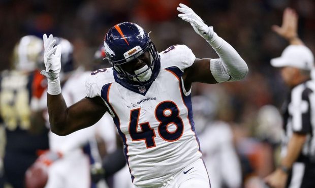 Shaquil Barrett #48 of the Denver Broncos celebrates a sack during the second half of a game agains...