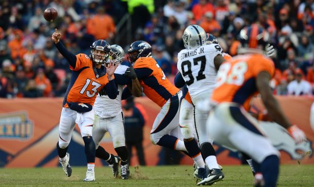 DENVER, CO - JANUARY 1:  Quarterback Trevor Siemian #13 of the Denver Broncos throws a completion t...