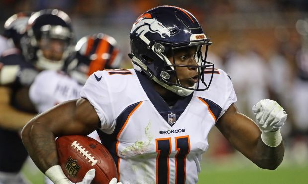 Carlos Henderson #11 of the Denver Broncos runs against the Chicago Bears during a preseason game a...