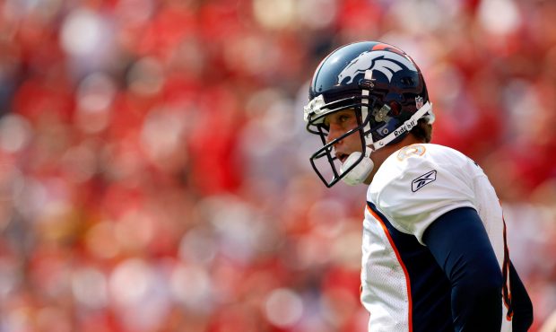 Quarterback Jay Cutler #6 of the Denver Broncos walks off the field after failing to make a first d...