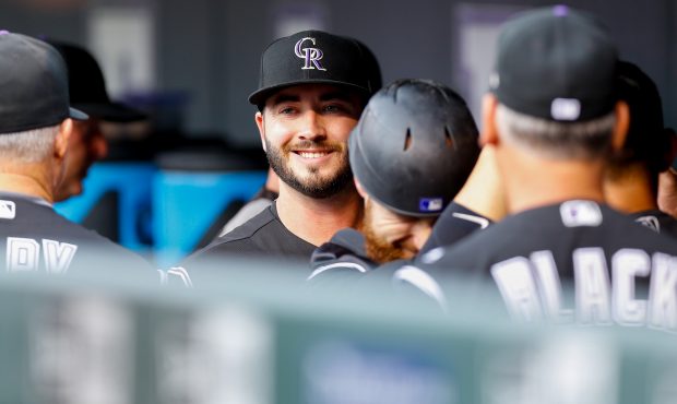 Chad Bettis #35 of the Colorado Rockies smiles in the dugout before pitching against the Atlanta Br...