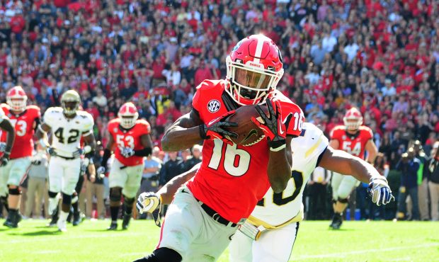 ATHENS, GA - NOVEMBER 26: Isaiah McKenzie #16 of the Georgia Bulldogs makes a catch for a touchdown...