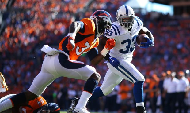 DENVER, CO - SEPTEMBER 18:  Running back Robert Turbin #33 of the Indianapolis Colts runs in for a ...
