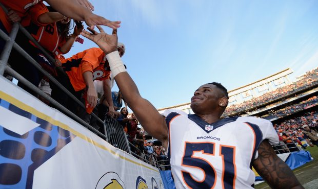 SAN DIEGO, CA - DECEMBER 14:  Linebacker Todd Davis #51 of the Denver Broncos celebrates with fans ...