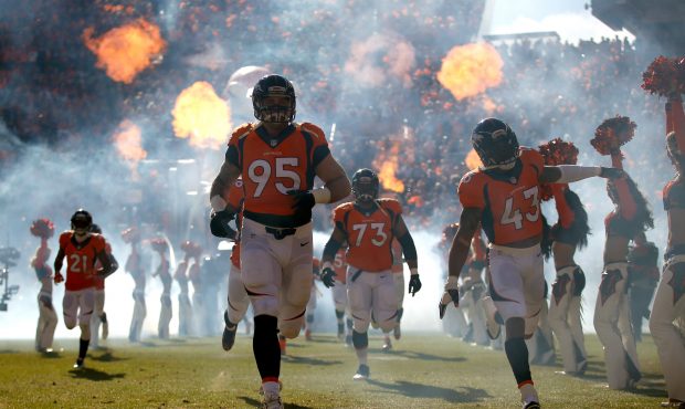 DENVER, CO - JANUARY 24:  The Denver Broncos take the field for the AFC Championship game against t...