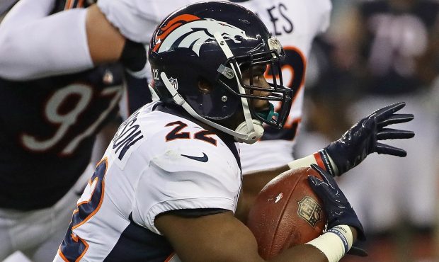CHICAGO, IL - AUGUST 10:  C.J. Anderson #22 of the Denver Broncos runs against the Chicago Bears
du...