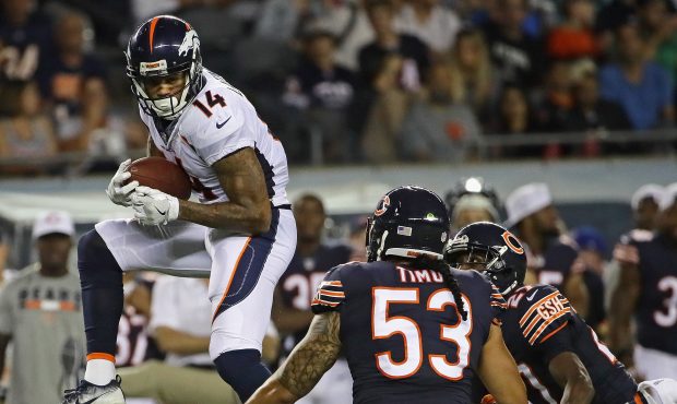 CHICAGO, IL - AUGUST 10:    Cody Latimer #14 of the Denver Broncos catches a pass over John Timu #5...