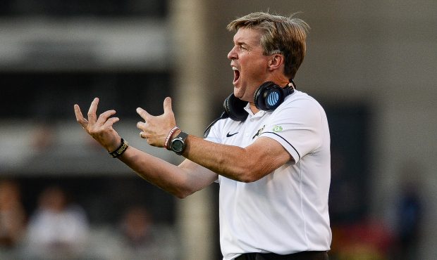 BOULDER, CO - SEPTEMBER 10:  Head coach Mike MacIntyre of the Colorado Buffaloes reacts on the side...