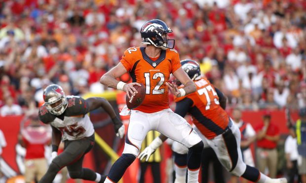 TAMPA, FL - OCTOBER 2:  Quarterback Paxton Lynch #12 of the Denver Broncos looks for an open receiv...