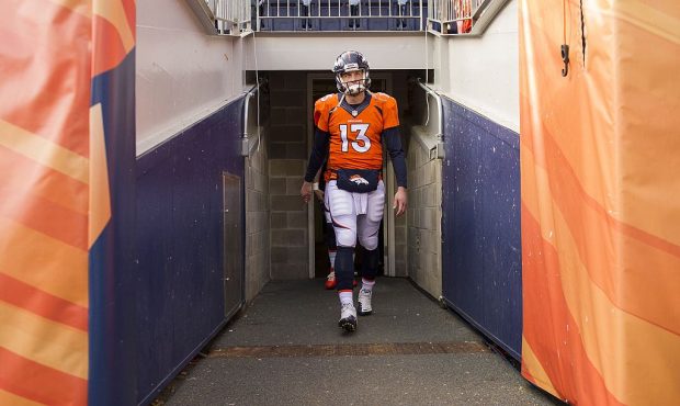 Quarterback Trevor Siemian #13 of the Denver Broncos exits the tunnels and on to the field before t...