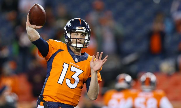 Quarterback Trevor Siemian #13 of the Denver Broncos warms up before the game against the Kansas Ci...