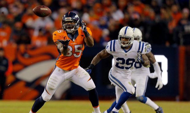 DENVER, CO - JANUARY 11:  Virgil Green #85 of the Denver Broncos waits for a throw as  Mike Adams #...