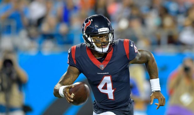 CHARLOTTE, NC - AUGUST 09:  Deshaun Watson #4 of the Houston Texans rolls out against the Carolina ...