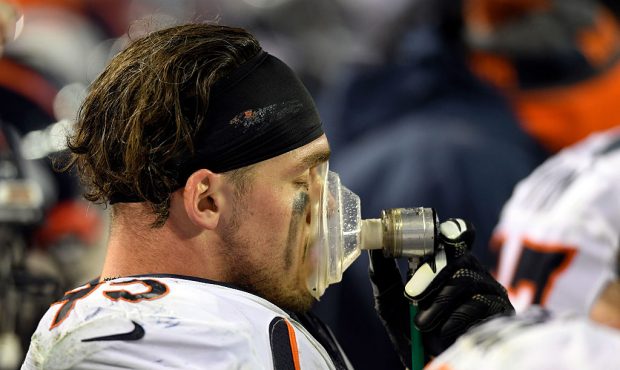 KANSAS CITY, MO - DECEMBER 25:  Defensive end Derek Wolfe #95 of the Denver Broncos takes oxygen du...