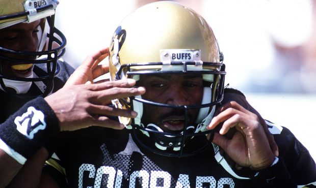 11 SEP 1993:  COLORADO WIDE RECEIVER CHARLES JOHNSON IS CCONGRATULATED BY teammates DURING THE BUFF...