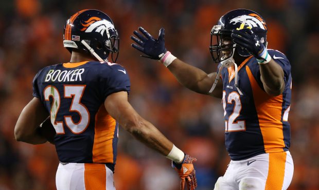 DENVER, CO - OCTOBER 24:  Running back Devontae Booker #23 and running back C.J. Anderson #22 of th...