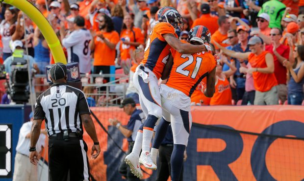 DENVER, CO - SEPTEMBER 13: Cornerback Aqib Talib #21 of the Denver Broncos celebrates with cornerba...