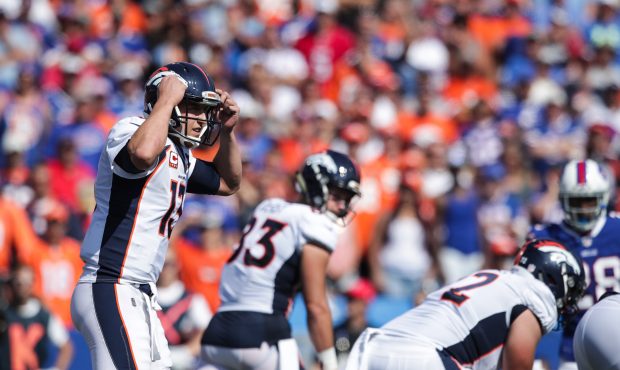 ORCHARD PARK, NY - SEPTEMBER 24:  Trevor Siemian #13 of the Denver Broncos makes a signal during an...
