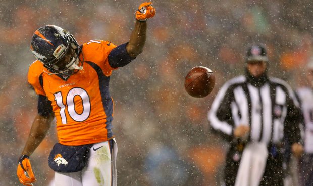 DENVER, CO - NOVEMBER 29: Wide receiver Emmanuel Sanders #10 of the Denver Broncos celebrates after...