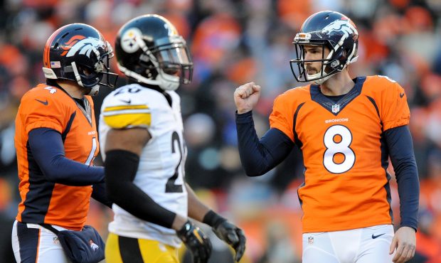 DENVER, CO - JANUARY 17: Brandon McManus #8 of the Denver Broncos celebrates after kicking a 51 yar...