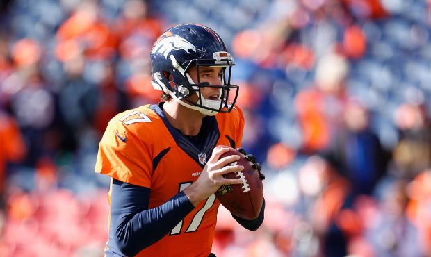 DENVER, CO - JANUARY 24: Quarterback Brock Osweiler #17 of the Denver Broncos warms up before the A...