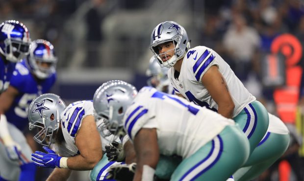 ARLINGTON, TX - SEPTEMBER 10:  Dak Prescott #4 of the Dallas Cowboys stands behind center in the se...