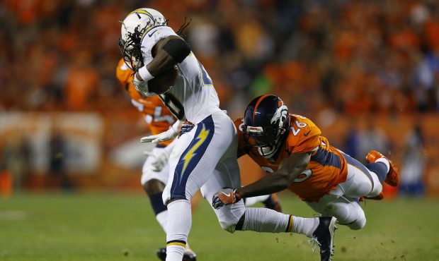 DENVER, CO - SEPTEMBER 11:  Free safety Darian Stewart #26 of the Denver Broncos tackles running ba...